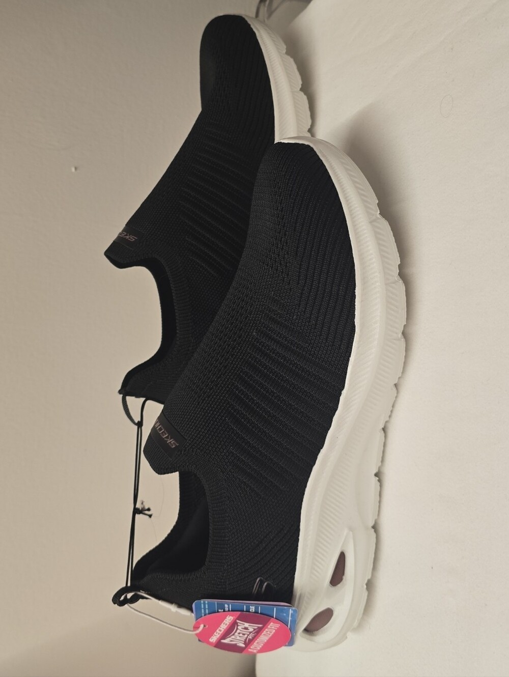 Skechers Black Knit Slip-On Sneakers with White Sole